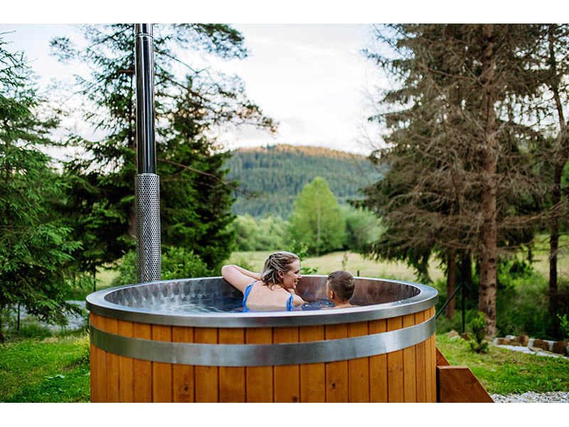 Hot tub with internal wood...