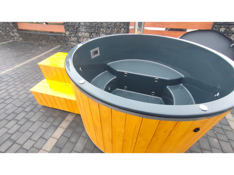 Hot tub with internal wood...
